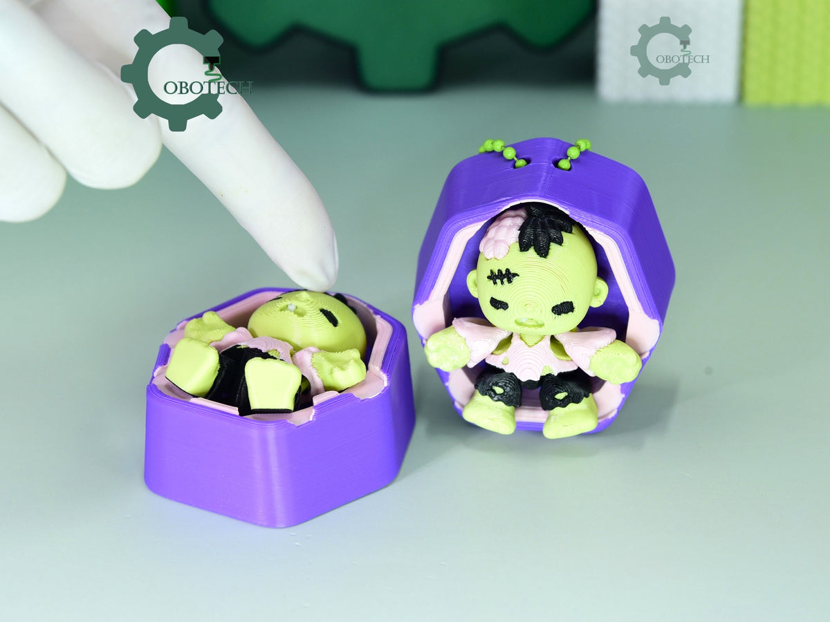 Cobotech-Coffin Zombie Flexi Clicker Keychain_01.jpg
